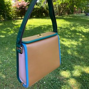 Coach Turnlock Shoulder bag.